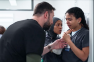 Scene from the show "The Pitt" where an ER physician and nurse are checking in on a nurse who was recently assaulted