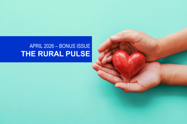 Hands holding small red heart on turquois background, Rural Pulse April 2026 Bonus Issue