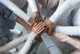 Colleagues huddle