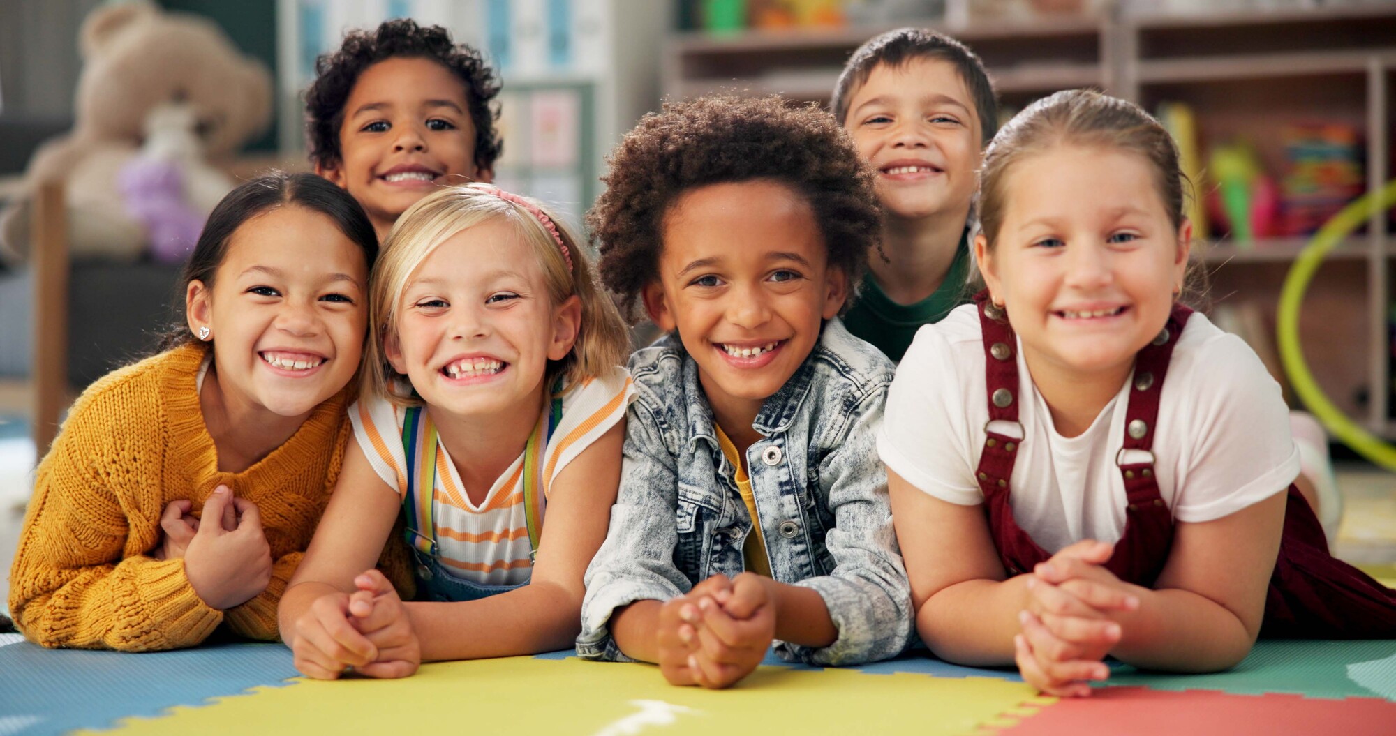 Middle school-aged kids smiling