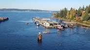 Pontoons being towed by tugboats on Lake Washington