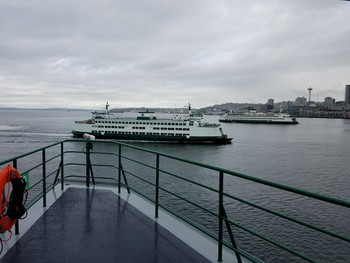 Photo of multiple ferries in Seattle's Elliott Bay