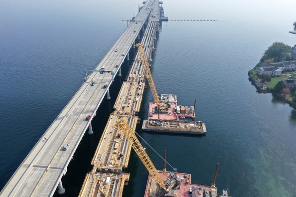 Photo of the eastbound bridge construction with Union Bay in the background