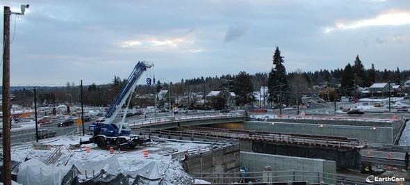 Recent photo of construction for the future Montlake lid during winter weather.
