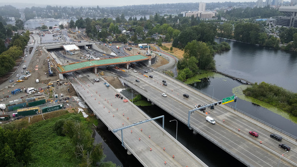 Aerial view looking northwest at parallel “twin” bridges on SR 520 approaching Seattle's Montlake neighborhood.