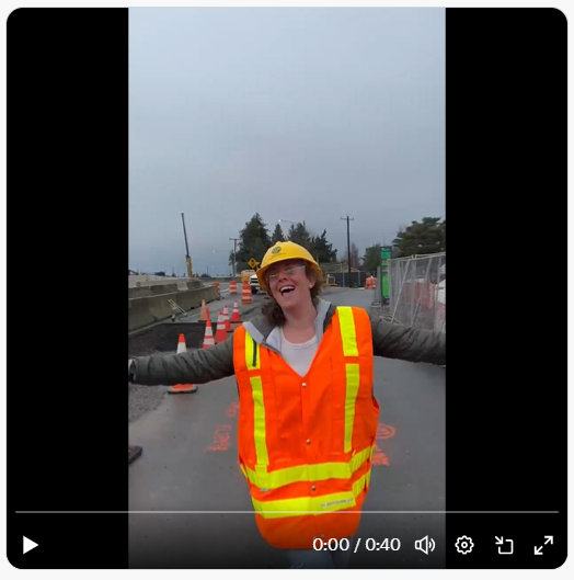 Graphic shows screenshot of Trail reopening video with woman in construction gear outside.PNG