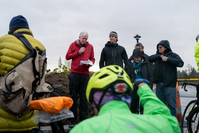 group of cyclists gray day 