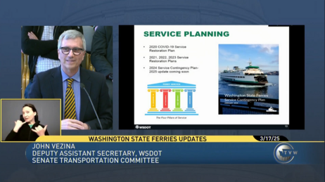Screenshot of a TVW recording of a meeting showing a person speaking at a microphone beside a presentation slide on FAC demographics