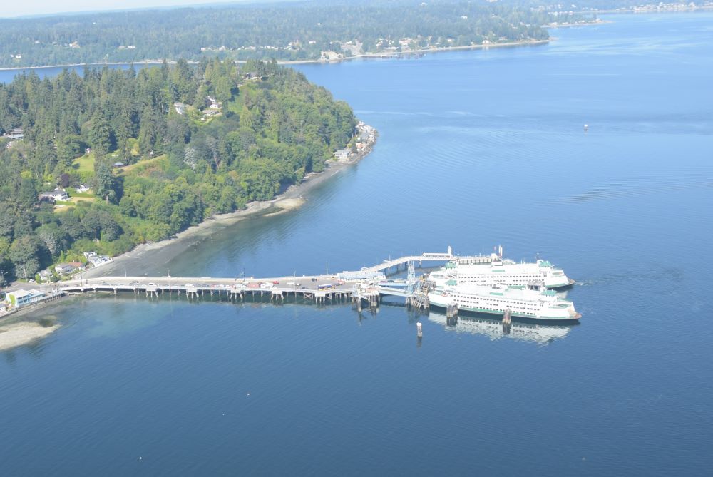 Aerial view of Vashon terminal with two ferries docked with Kitsap County in the background