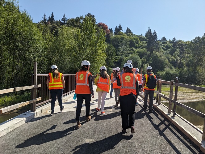 active transportation team crosses bridge