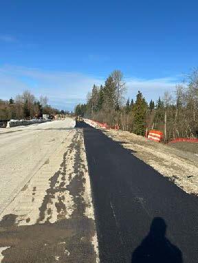 A fresh strip of asphalt stretches along the shoulder of northbound Interstate 5 near Stanwood.