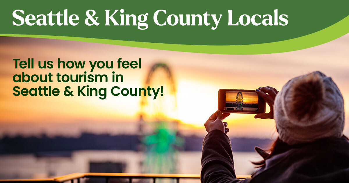 A person photographs a sunset over water with their phone with text asking Seattle & King County locals to tell us how you feel about tourism.