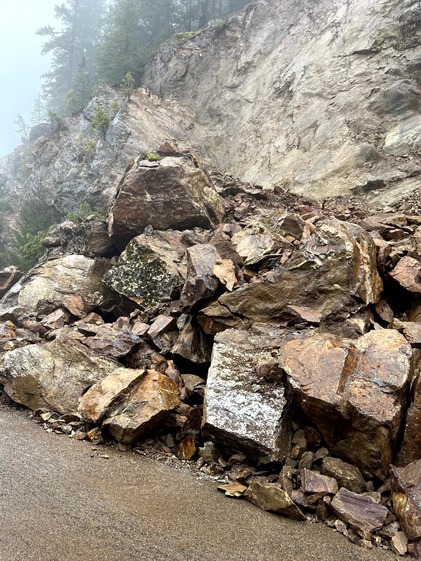 Boulders sit on State Route 20 near milepost 31 after a slide in March.