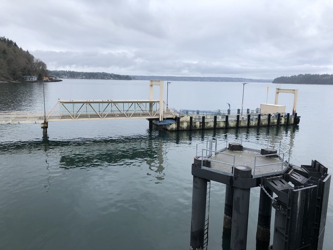 Vashon terminal passenger-only dock extends into calm, gray-blue water under an overcast sky.