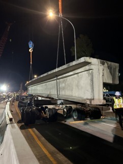 Crews remove a piece of the old ramp