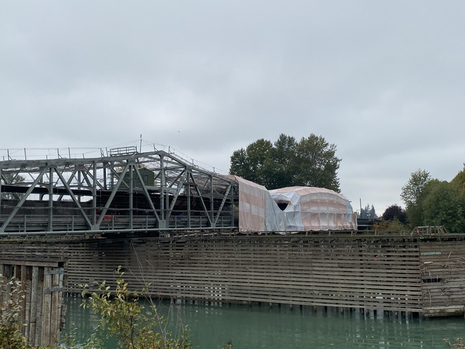 A containment system covers the western span of the SR 536 Skagit River Bridge in Mount Vernon and part of the eastern span.
