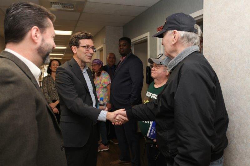 Governor Ferguson shakes the hand of a Veteran