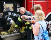 Firefighter with children