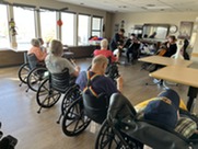 Residents listening to Symphony Orchestra