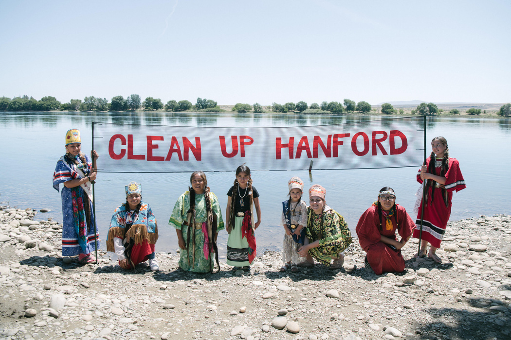 Yakama children holding sign