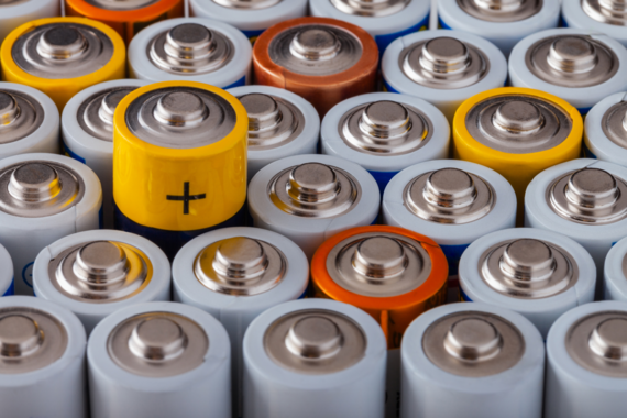 a tightly packed group of batteries in various colors