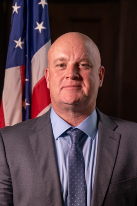 A headshot of Scott Brummer.