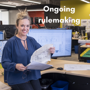 Image depicts a woman holding papers and the words "Rulemaking update"