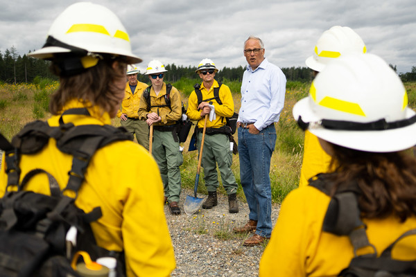 Governor Inslee visits DNR wildland firefighting trainees during an exercise on JBLM land on June 30, 2022.