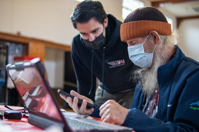 A veteran at the Washington Soldier's Home in Orting receives a new phone and Chromebook through the WDVA Digital Navigator program.