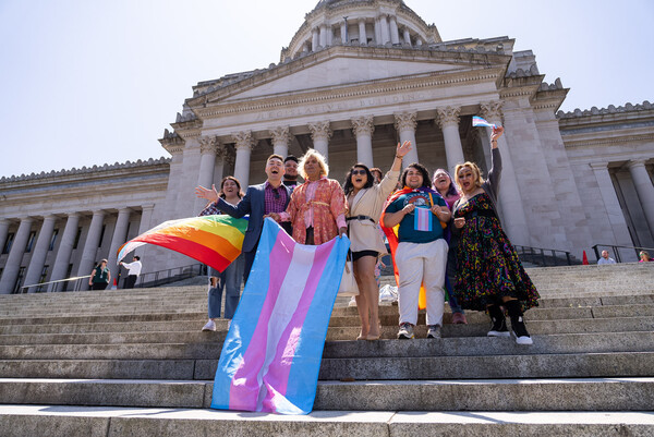 LGBTQ+ advocates gathered on the steps of the Capitol