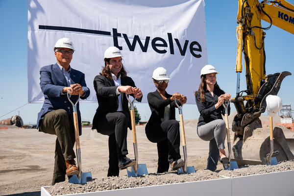 Shovel in hand, Gov. Jay Inslee stands ready to break ground at the site of a future sustainable aviation fuel production facility.