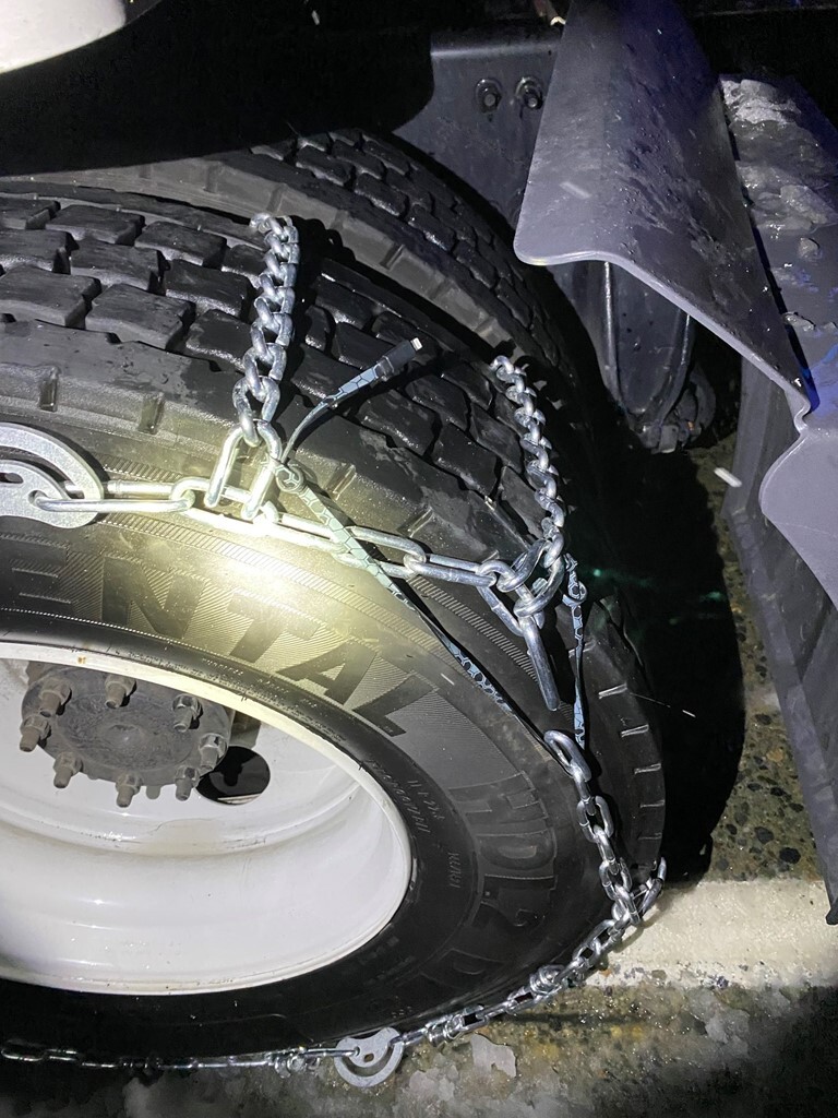 A driver used a USB cable to hold together inoperable tire chains.