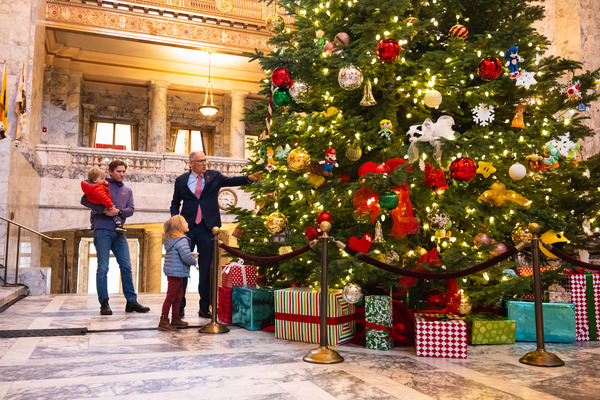 Gov. Jay Inslee shows off the Christmas Tree at the Washington State Capitol