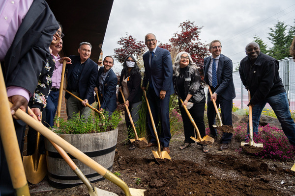 Gov. Jay Inslee helps break ground at an affordable housing development in Renton.