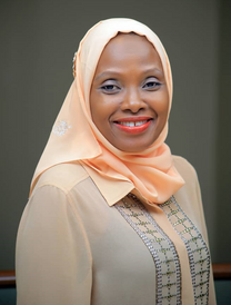 Janet Nambi Kiwanuka wearing a headscarf