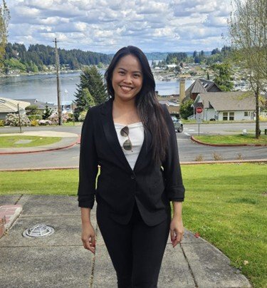 WIN Secretary Martha Villarosa-Walker wearing a black pants suit