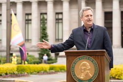 Commissioner of Public Lands Dave Upthegrove gives remarks at 2025 pride flag raising at the state capitol