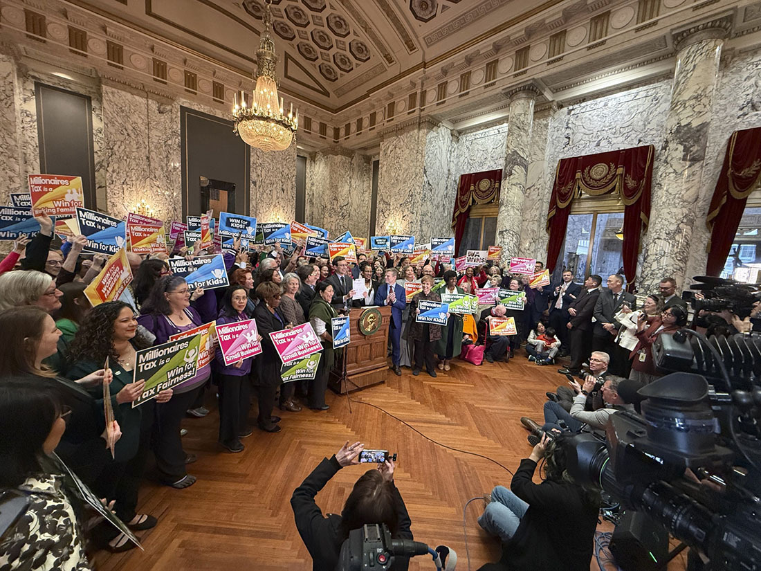 Millionaires' Tax signing event