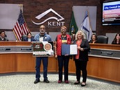 Mayor Dana Ralph poses with Gwen Allen-Carston, Executive Director for the KBAC, holding the proclamation for Juneteenth