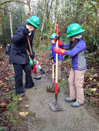 youth doing trail work