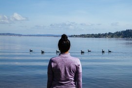 Woman looking at water