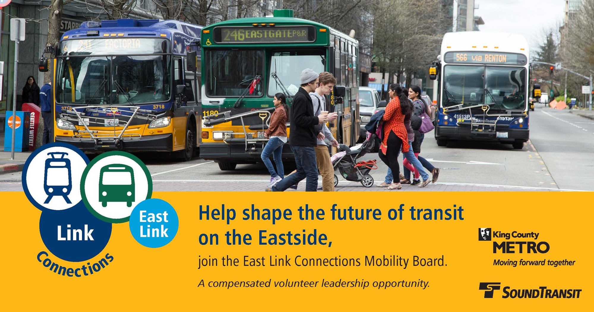 in foreground, people using a city crosswalk and in background, 2 King County Metro buses and 1 Sound Transit Express bus