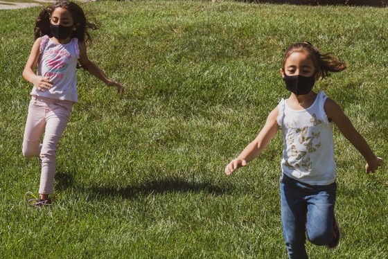 kids playing in masks
