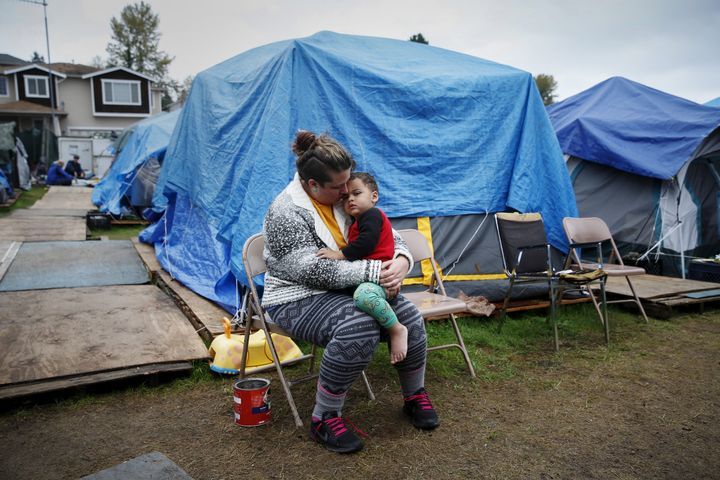 Mom, baby - Tents- Photo by Reuters