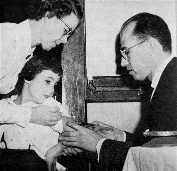 Salk administers polio vaccinePhoto-  By Yousuf Karsh, photographer - Wisdom Magazine, Aug. 1956 