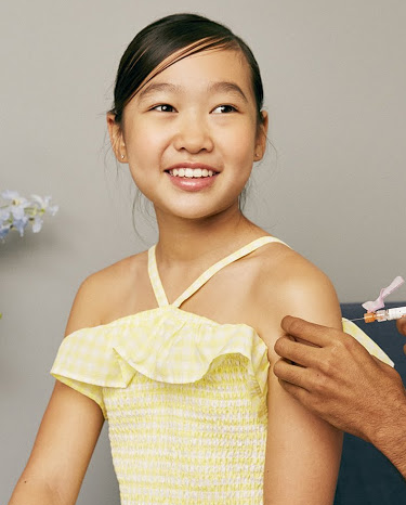 KC-preteen getting vaccine