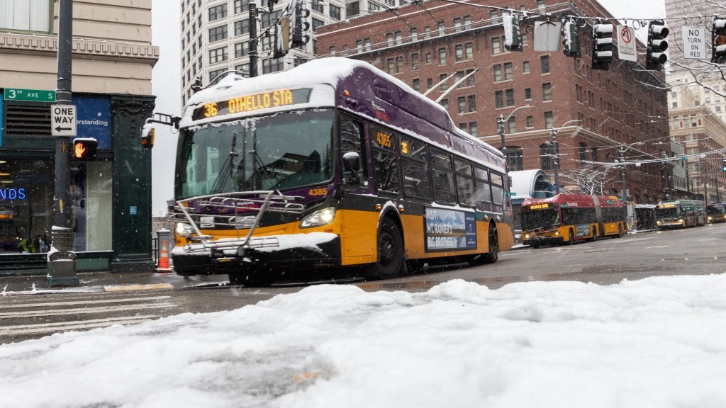This shows a trolley route 36 bus turning onto 3rd Ave going south in the snow