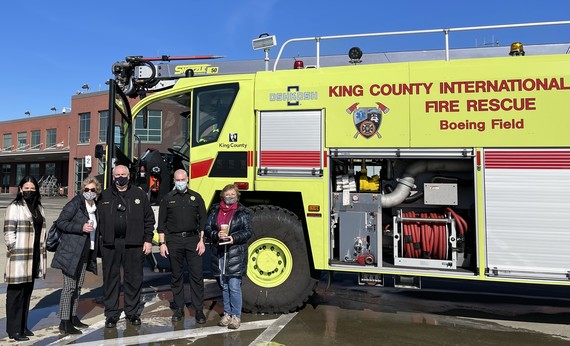 Sarah Perry with group and fire engine