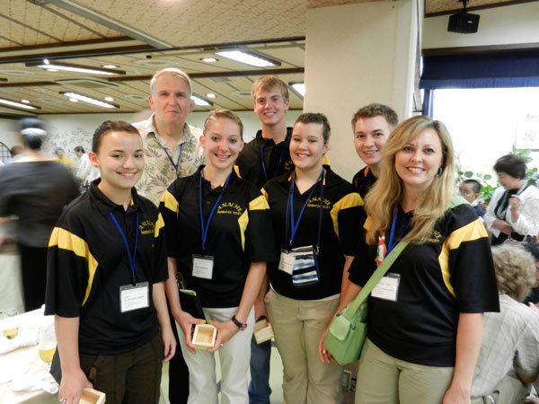 APS student volunteers with John Hopper on a visit to Japan.