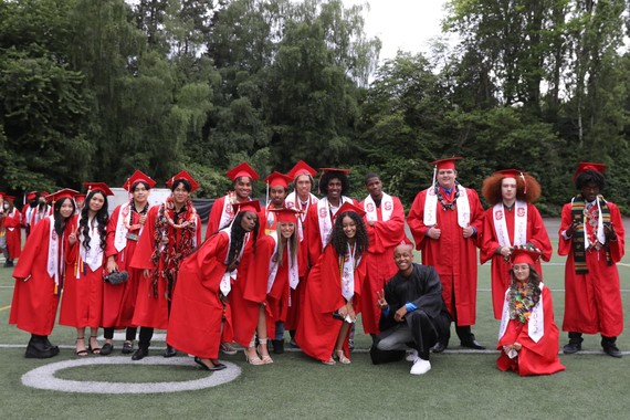 Cleveland High School graduating class group photo, with CM Zahilay in the front, kneeling 